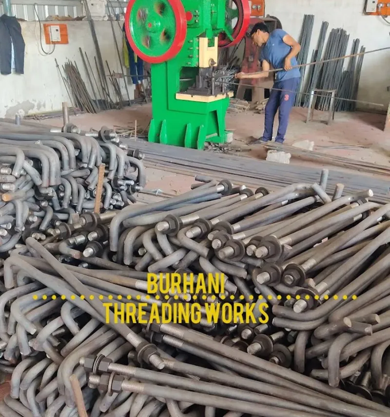Foundation bolts stacked on the Kapasi Iron production floor in Indore